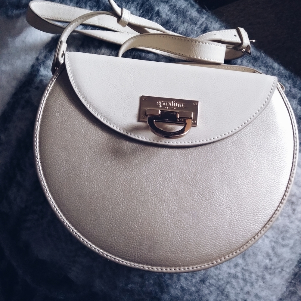 Like new Spatrina round bag..